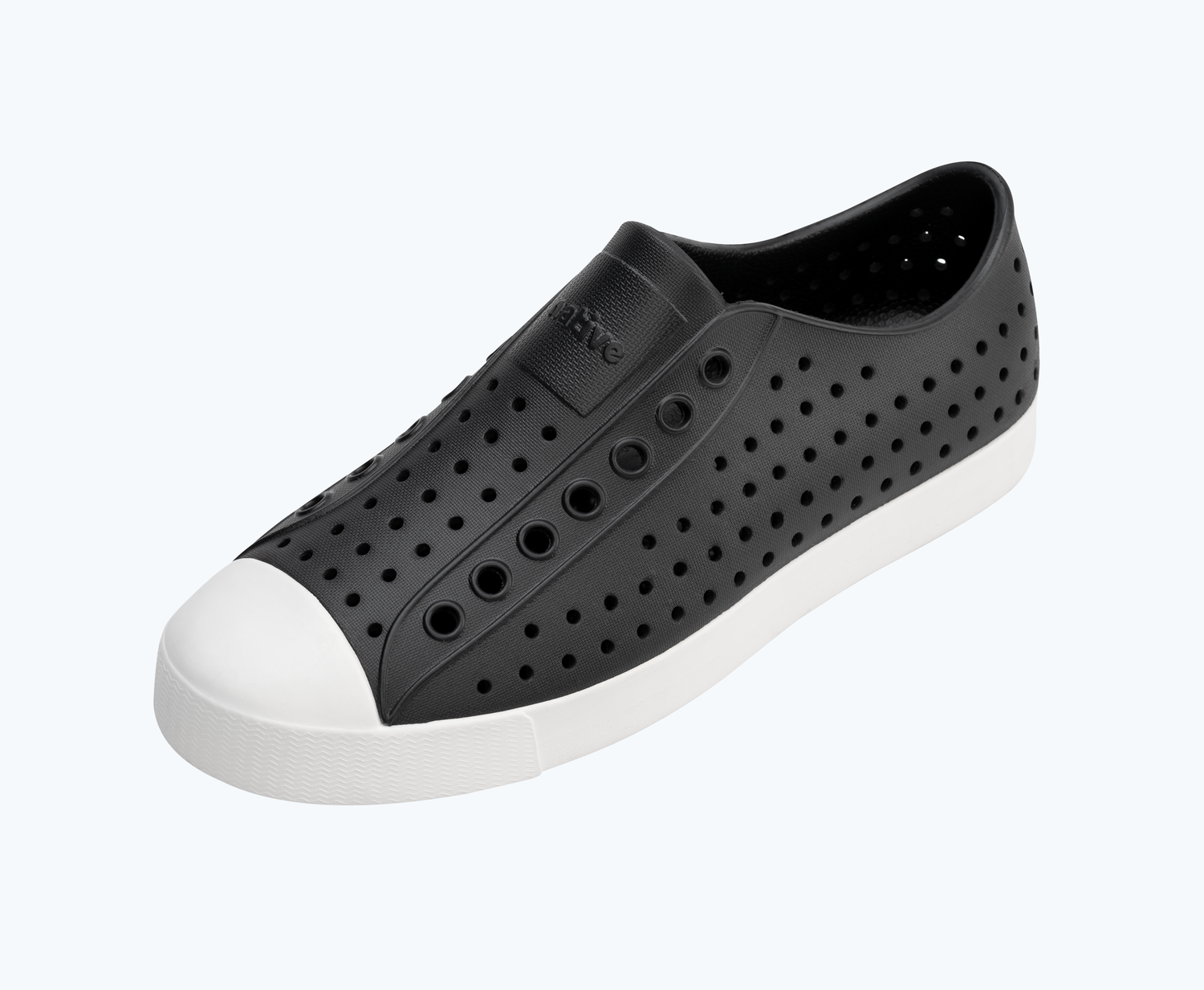 Angled view of a Native Shoes Jefferson | Jiffy Black/ Shell White Footwear