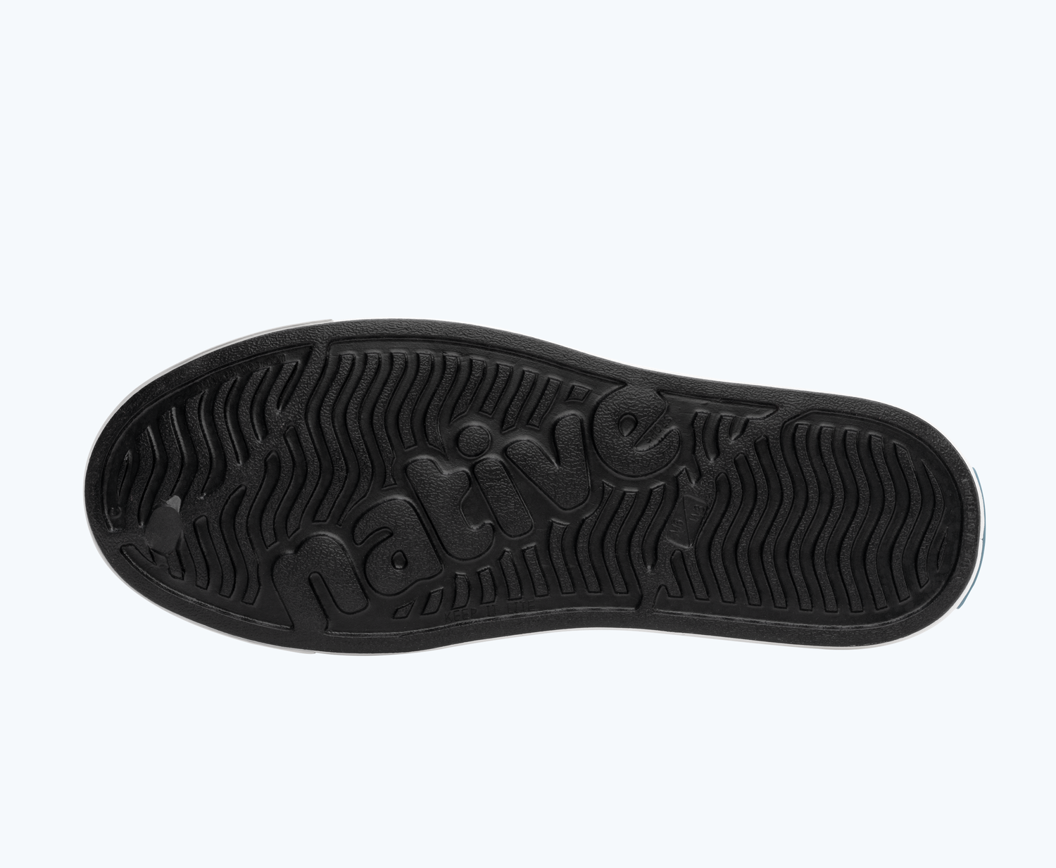 Bottom view of a Native Shoes Jefferson | Jiffy Black/ Shell White Footwear