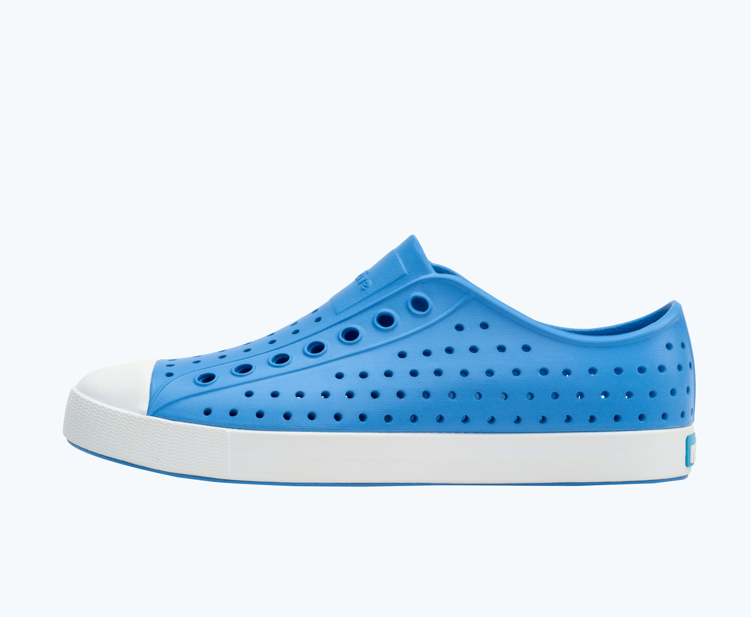 Side view of a Native Shoes Adults Jefferson | Resting Blue/ Shell White Footwear