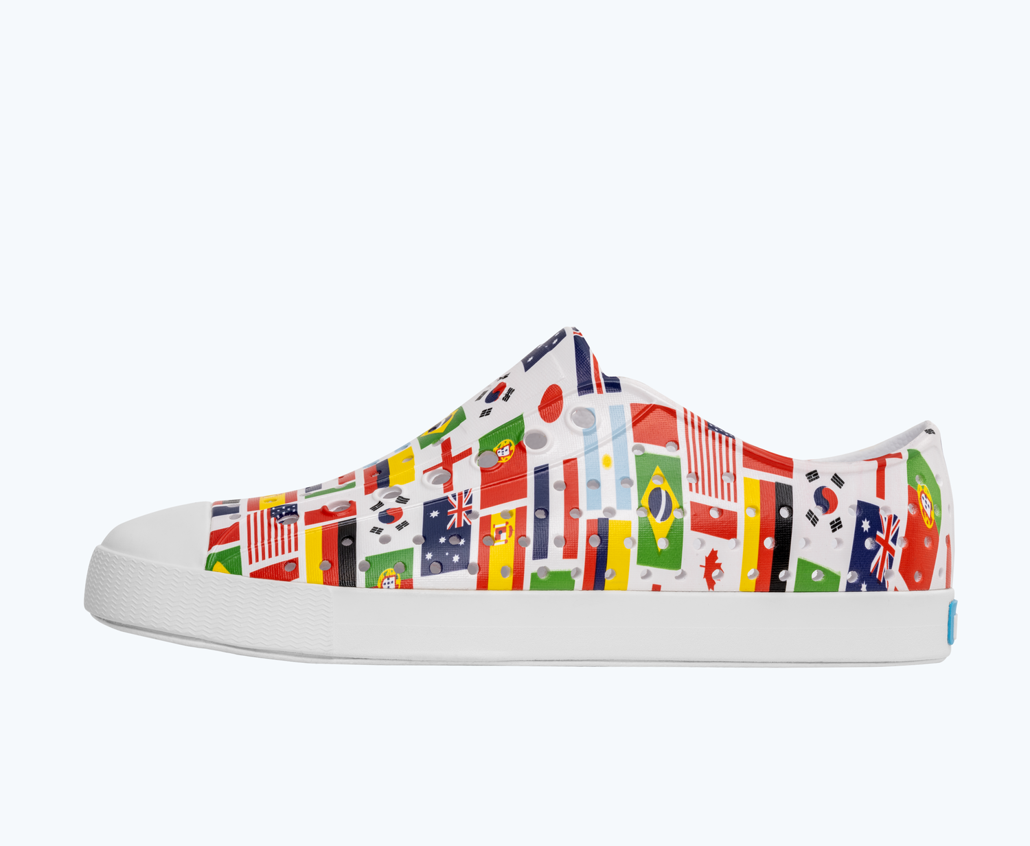 Side view of a Native Shoes Adults Jefferson Print | Shell White/ Shell White/ International Flags Footwear