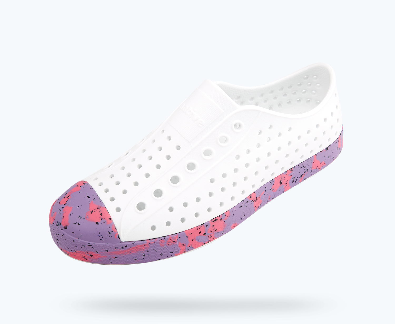 Angled view of a Native Shoes Jefferson Marbled | Shell White/ Sea Fan Dazzle Marble Footwear