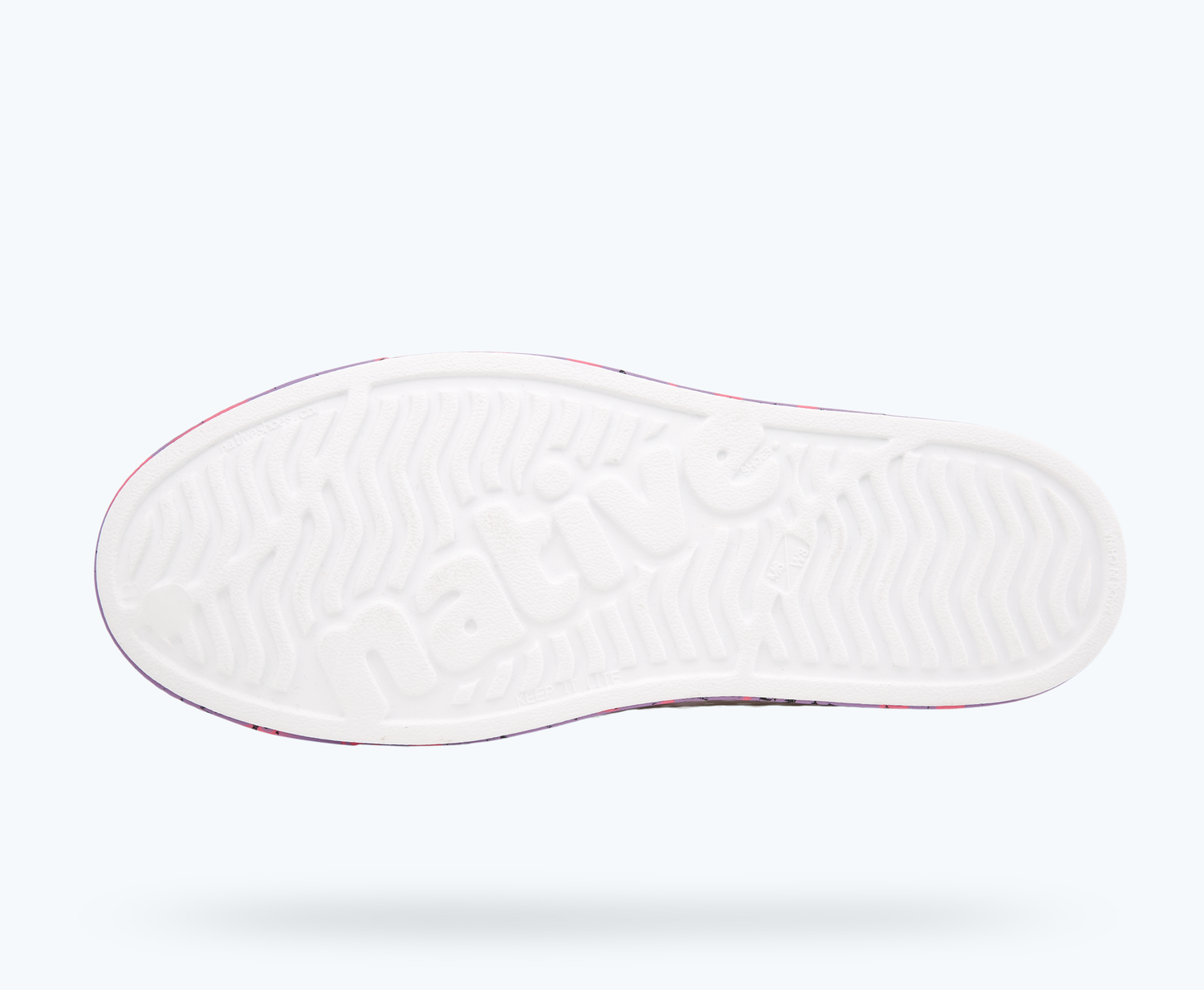 Bottom view of a Native Shoes Jefferson Marbled | Shell White/ Sea Fan Dazzle Marble Footwear