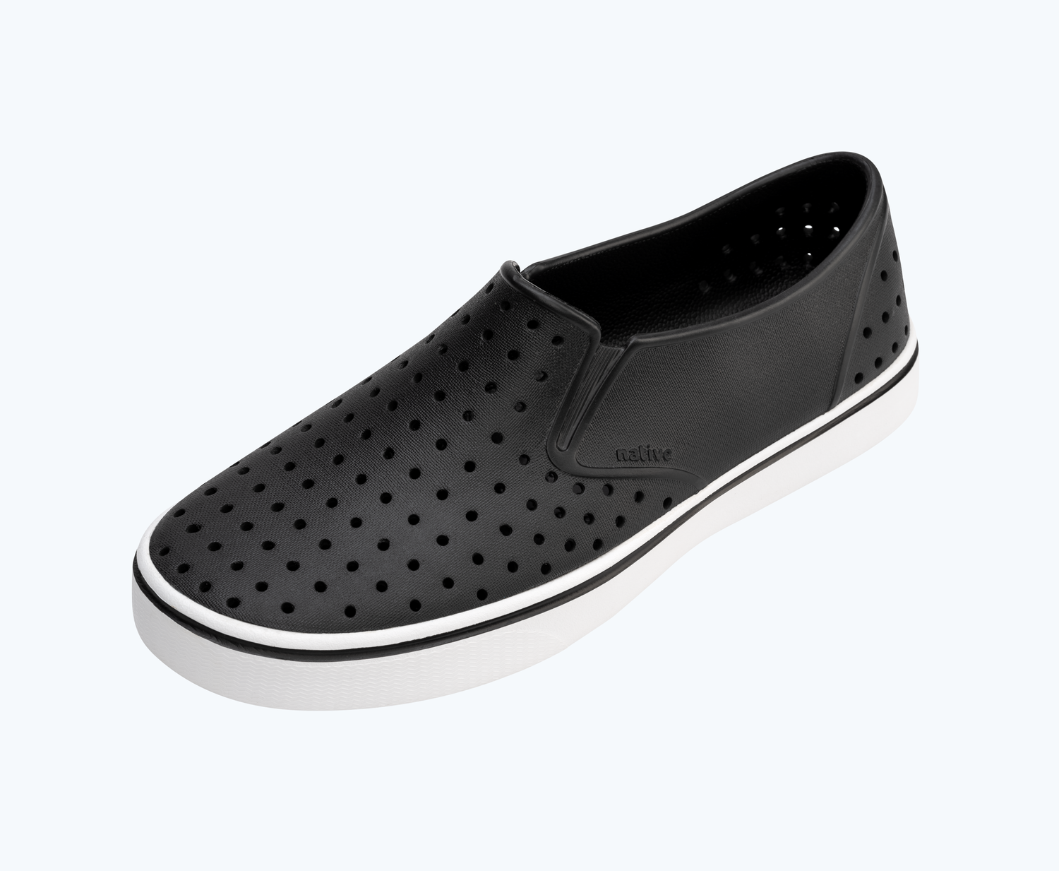 Angled view of a Native Shoes Miles | Jiffy Black/ Shell White Footwear