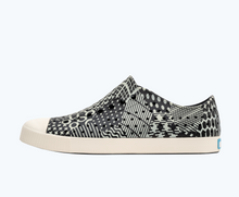 Side view of a Native Shoes Adults Jefferson Print | Jiffy Black/ Bone White/ Jiffy Bone Multi Hex Footwear