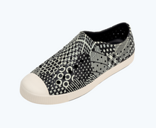 Angled view of a Native Shoes Jefferson Print | Jiffy Black/ Bone White/ Jiffy Bone Multi Hex Footwear