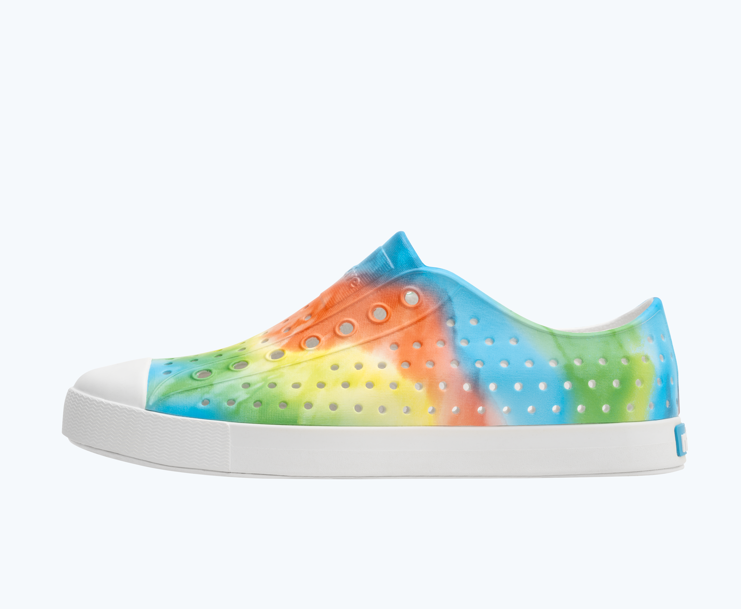 Side view of a Native Shoes Adults Jefferson Print | Shell White/ Shell White/ Rainbow Tie Dye Footwear