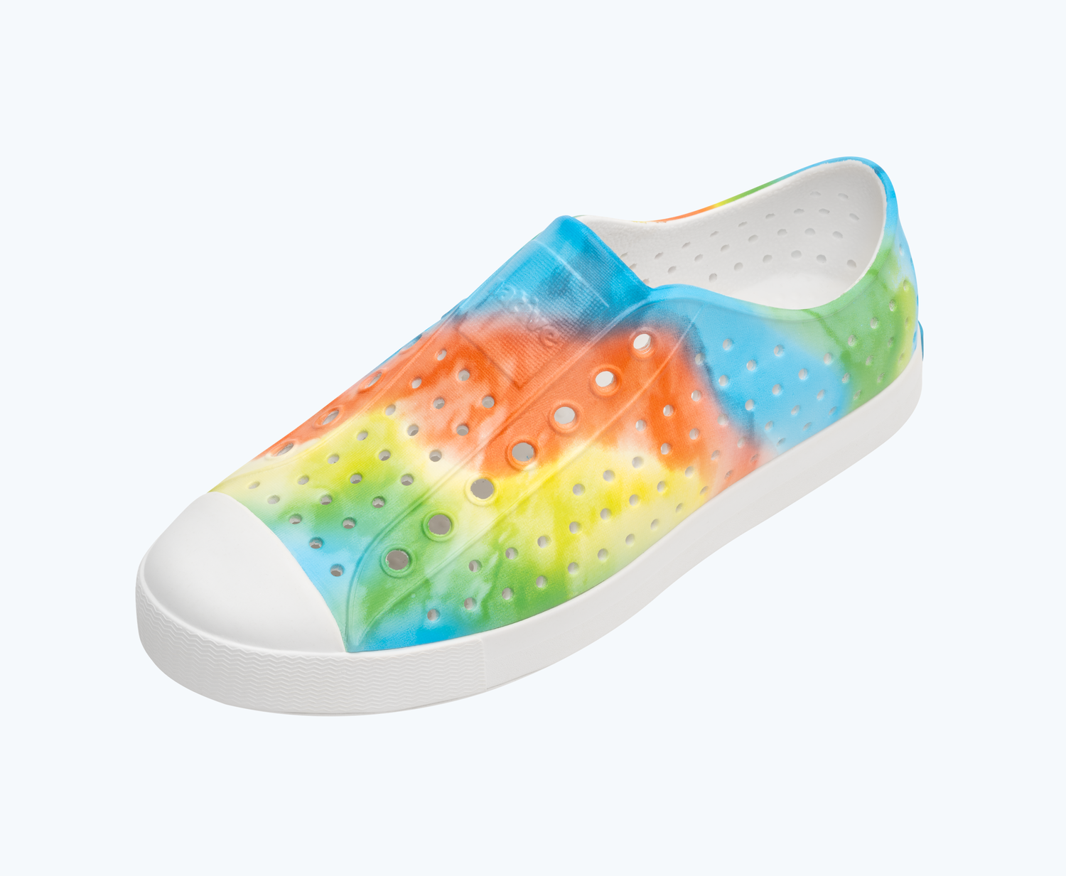 Angled view of a Native Shoes Jefferson Print | Shell White/ Shell White/ Rainbow Tie Dye Footwear
