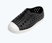 Angled view of a Native Shoes Kids Jefferson Kids | Jiffy Black/ Shell White Footwear