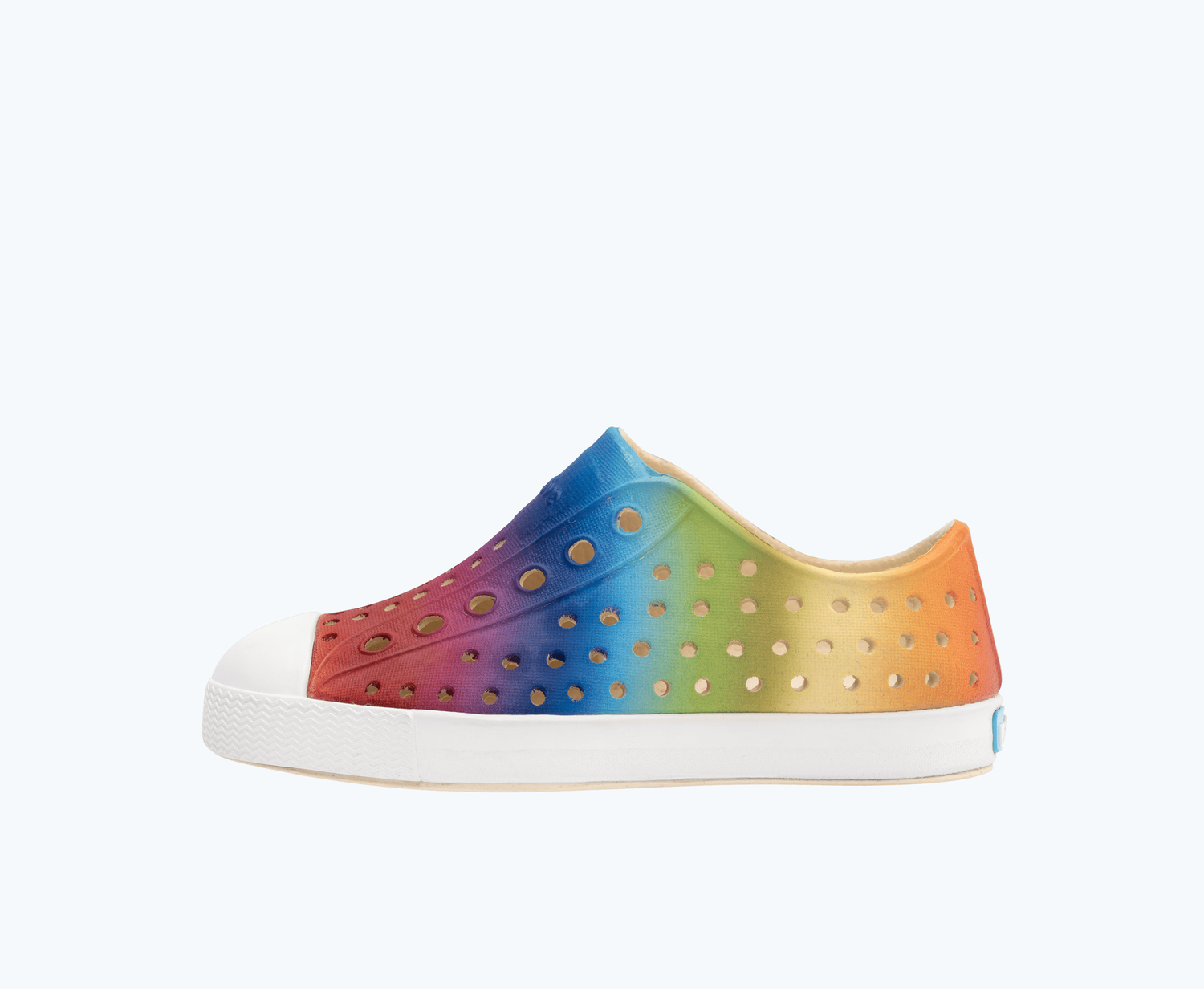 Side view of a Native Shoes Kids Jefferson Print Kids | Bone White/ Shell White/ Rainbow Gradient Footwear