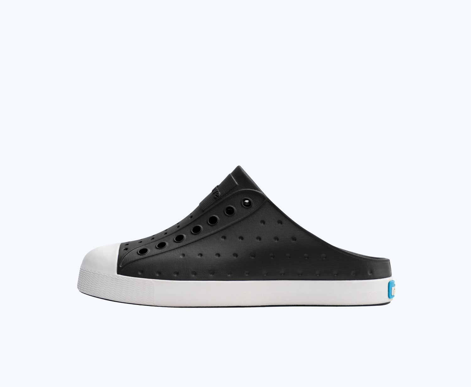 Side view of a Native Shoes Kids Jefferson Clog Kids | Jiffy Black/ Shell White Footwear