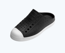 Angled view of a Native Shoes Kids Jefferson Clog Kids | Jiffy Black/ Shell White Footwear
