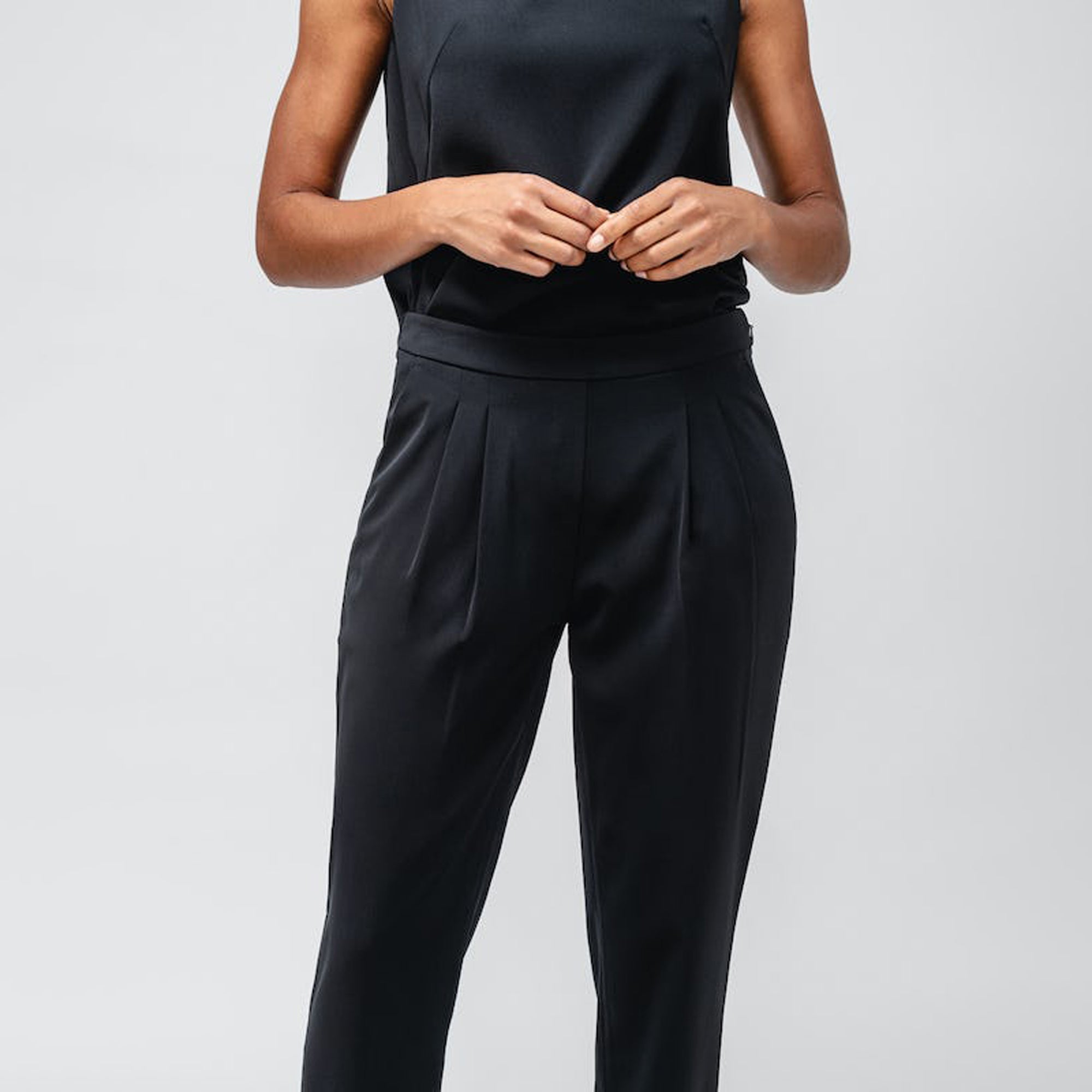 Close up of Black Women's Swift Drape Pant on model 