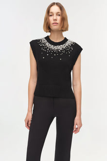 Black sleeveless knit vest with crystal beading across neckline and shoulders.