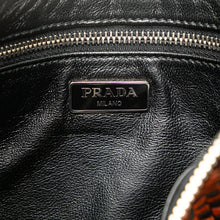 Prada | Pre-Owned Woven Goatskin Madras Zip Clutch | Brown