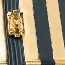 Chanel | Pre-Owned Metallic Lambskin Striped North South Boy Flap | Gold