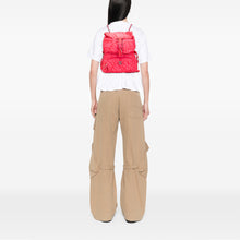 Chanel | Pre-Owned Printed Nylon Coco Neige Convertible Backpack | Pink