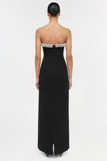 Black strapless floor-length gown with crystal embellished bustier trim and center back slit.
