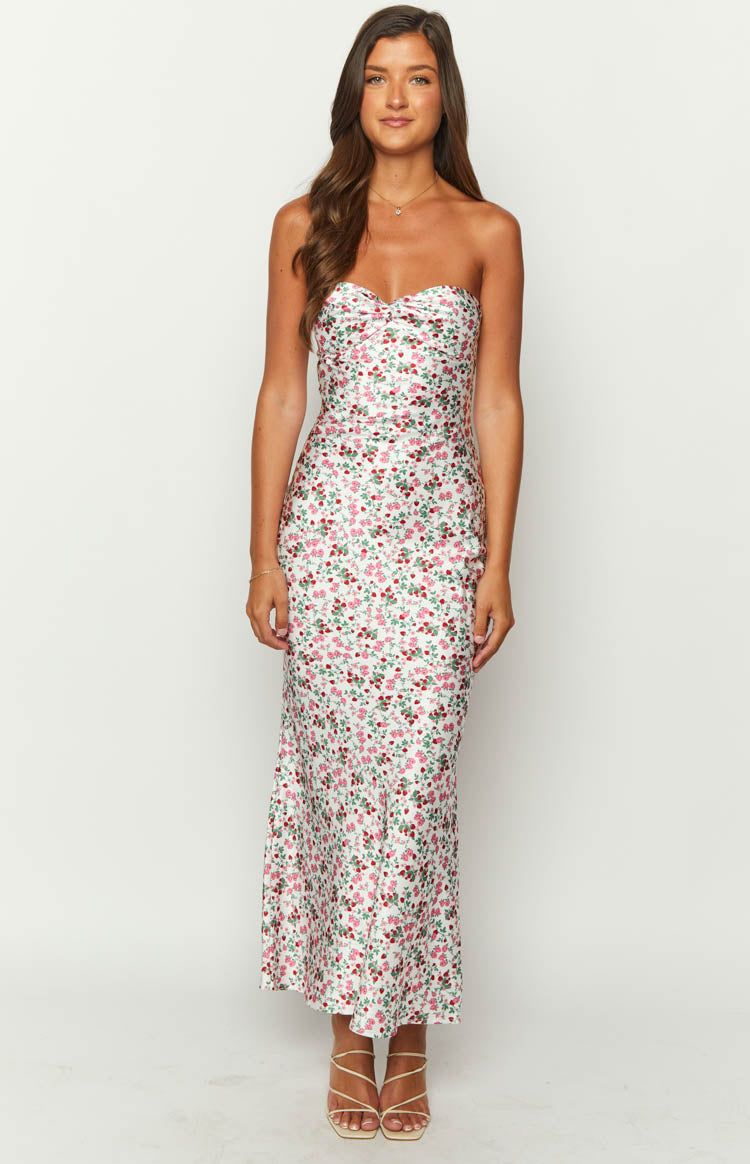White floral maxi dress with a strapless sweetheart neckline and fitted bodice