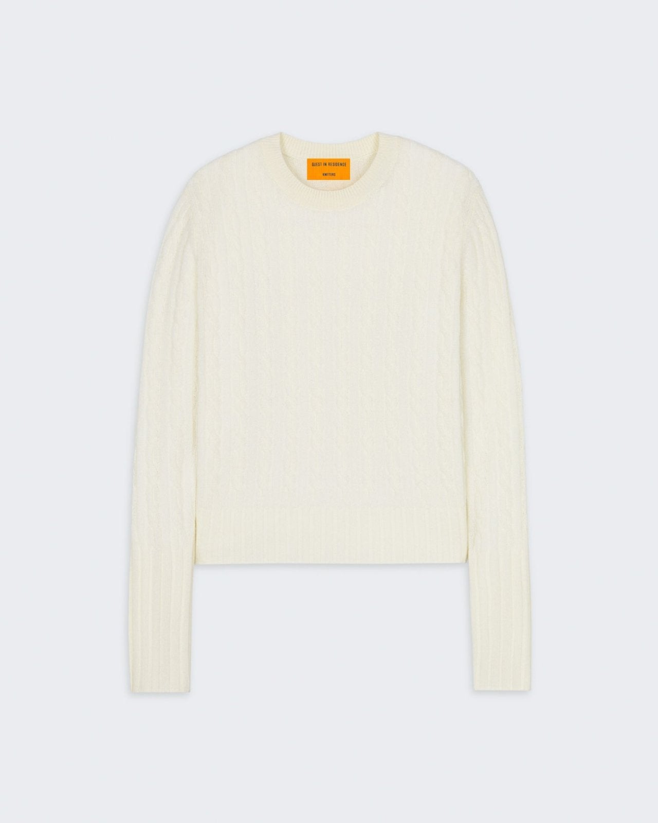 Cable Shrunken Crew - Cream womens slim fit cable knit sweater with ribbed cuffs and hem in light cream color.