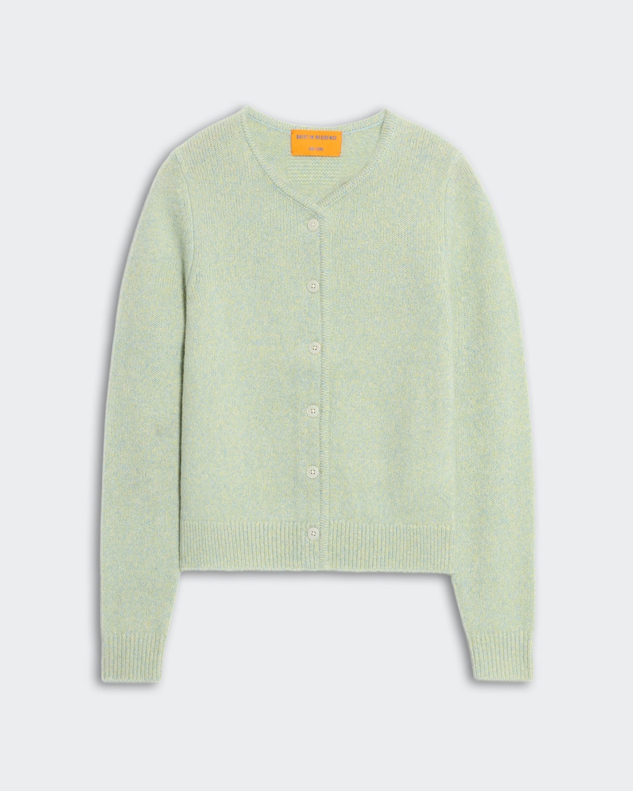 Mid-weight marled seaglass cardigan with front button closure, ribbed hem and cuffs, curved neck edge finish.
