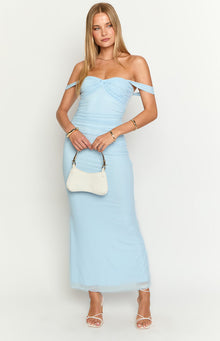 Full length front view of a light blue off-the-shoulder maxi dress with a twisted bust, ruched body, and sheer hem