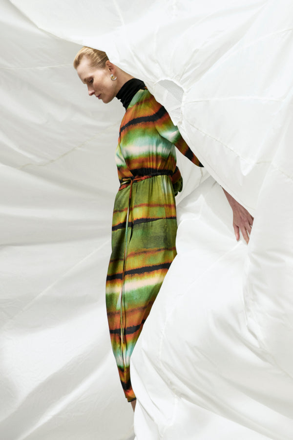 Front image of a woman wearing the Deana dress in Faded Print | Exclude