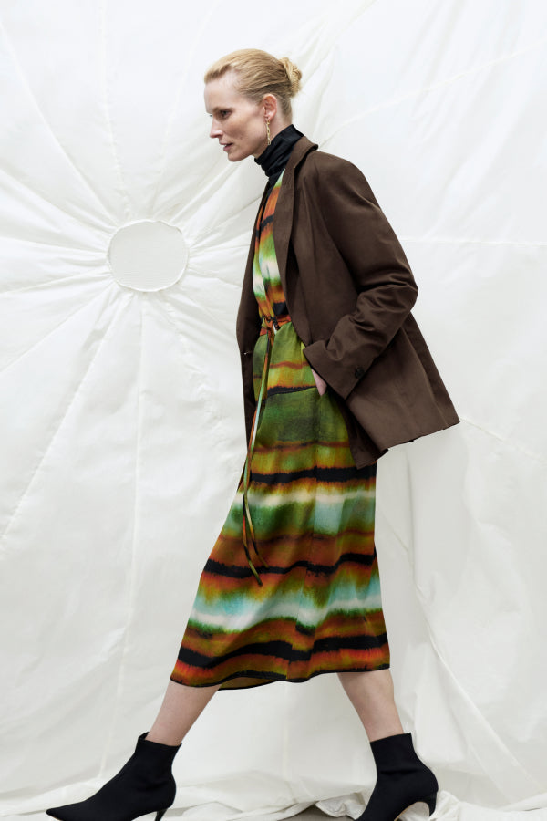 Front image of a woman wearing the Deana dress in Faded Print | Exclude