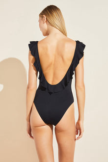 Model wears Loreta Smooth One-Piece in Black.
