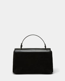 The Rudsak ESMA - 8324519 Black handbag features black suede and leather, a single top handle, a removable shoulder strap, and a structured rectangular shape. Shown against a light gray background, its design is simple and elegant.