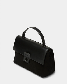 The Rudsak ESMA - 8324519 Black is a black suede and leather handbag featuring a top handle, removable shoulder strap, and front clasp closure, shown on a plain light grey background.