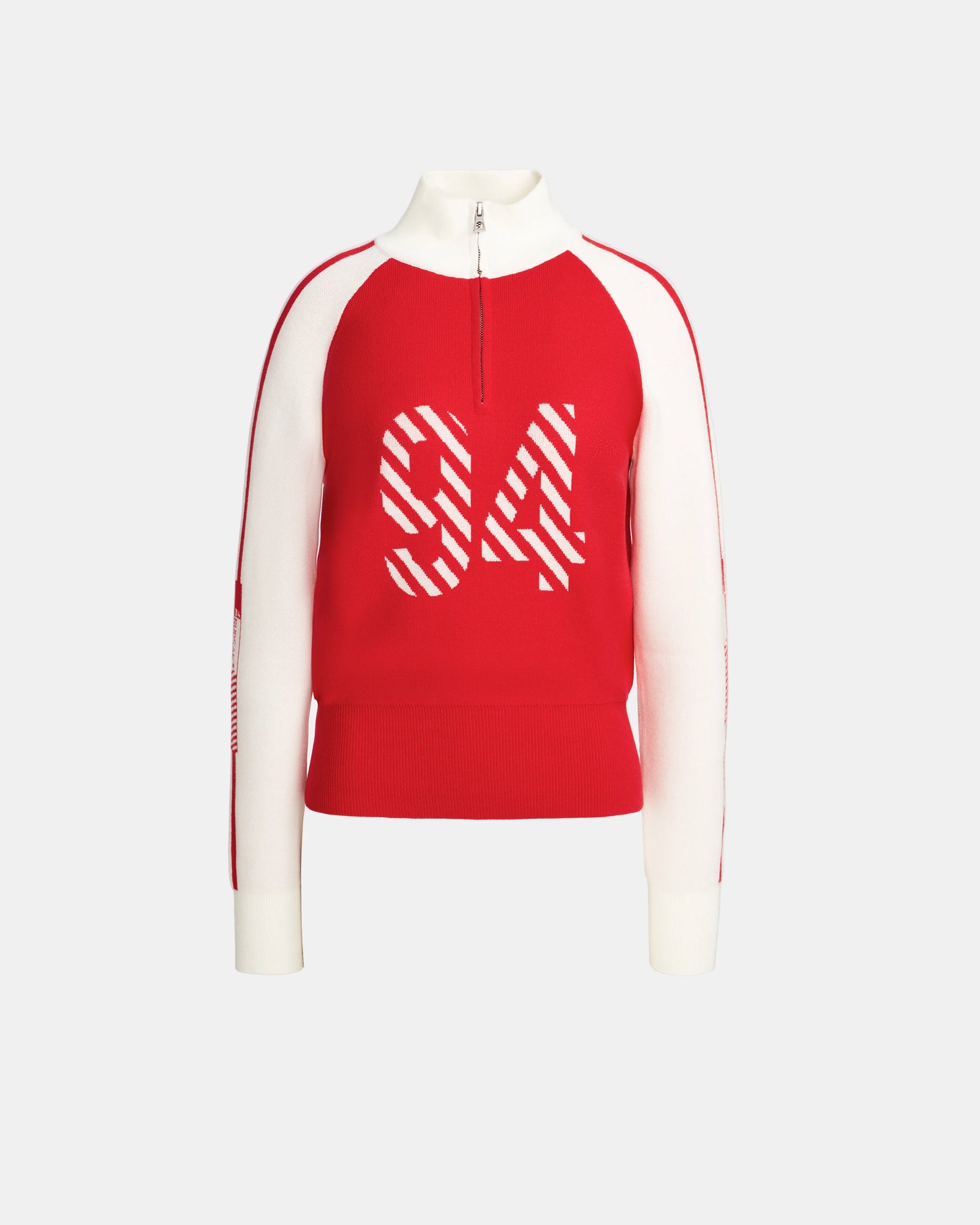 The Rudsak FANNY - 8524506 Flame Red women’s knit pullover boasts a bold red body with white side panels and cuffs, a mock-neck zip collar, and the number 94 in striking white stripes—perfect for après-ski style.