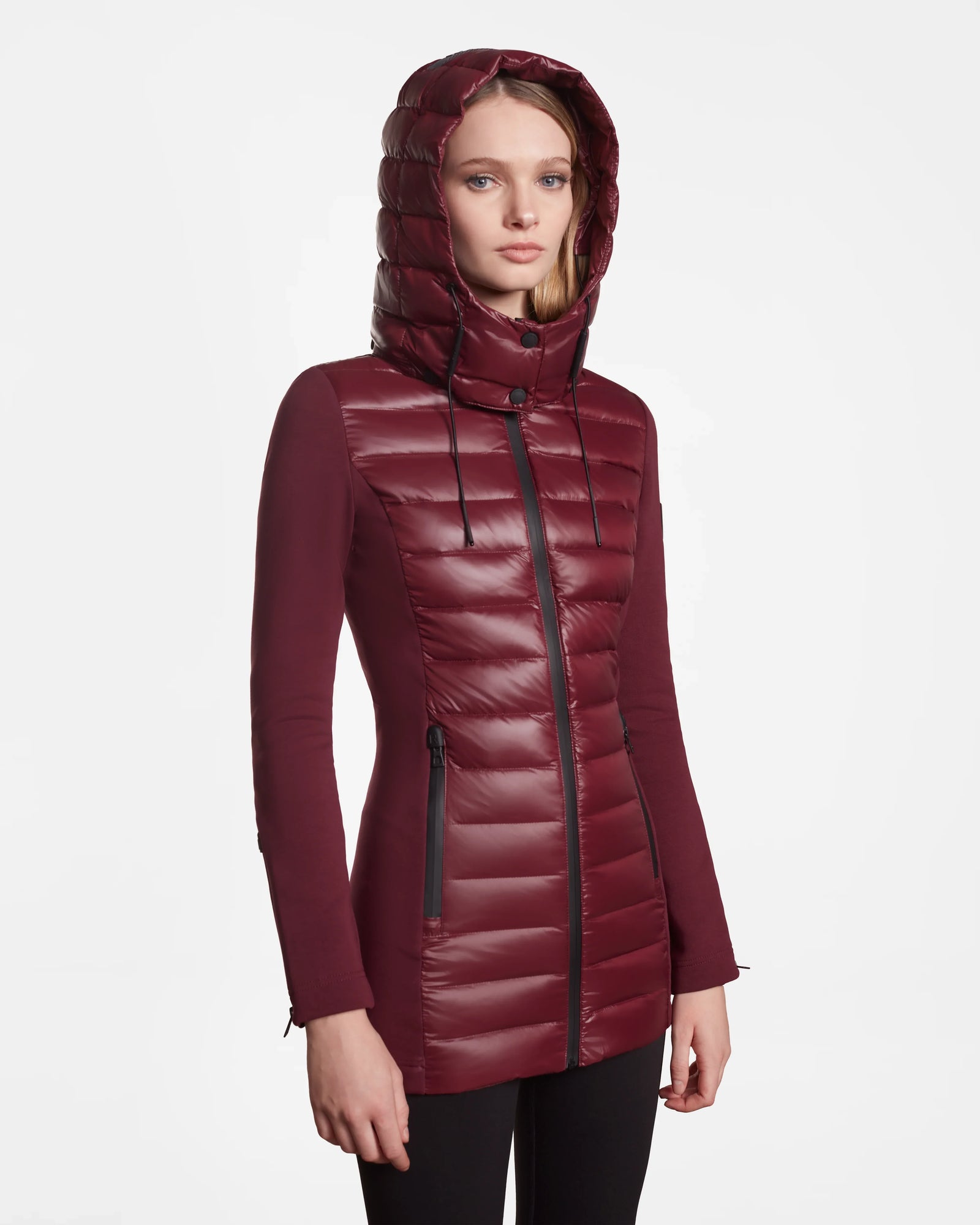 A woman in a Rudsak MARRY - L121003 Wine puffer coat.