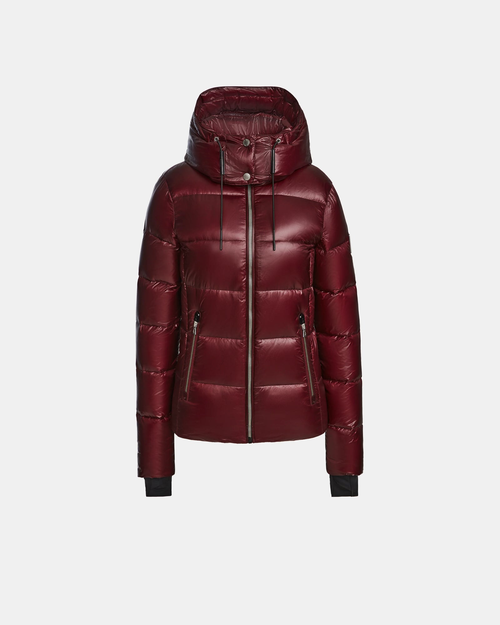 The Rudsak MIRRY S - L123545 Wine is a womens maroon quilted down coat with a hood, front zipper, side zippered pockets, and black cuff accents—ideal for stylish winter wear. Displayed on a plain white background.