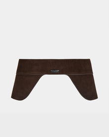 The Rudsak SIMONA S - 8424523 Espresso is a women’s wide brown suede waist belt with a structured saddle side design and two flared ends, elegantly draped and shown against a plain white background.