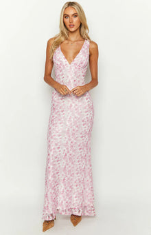 Full length front view of a pink floral lace maxi dress with a V-neckline and fitted silhouette