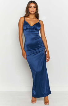 Navy satin formal dress with a ruched sweetheart neckline, thin straps, and a high side split