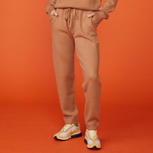 Front view of model wearing the supersoft sweater knit cuffed jogger in doe.