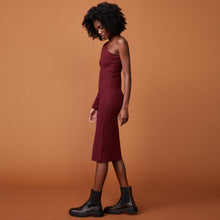 Side view of model wearing the supersoft sweater knit one shoulder dress in rhubarb.