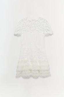 White lace short-sleeve dress with paisley pattern and tiered lace hem detail.