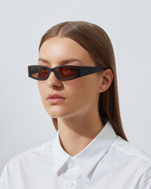 The Y2K Sunglasses | Black Recycled Steel Frame | Amber Poly Renew Lenses