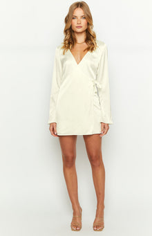 Cream satin long sleeve mini dress with a V-neck and side tie wrap detail