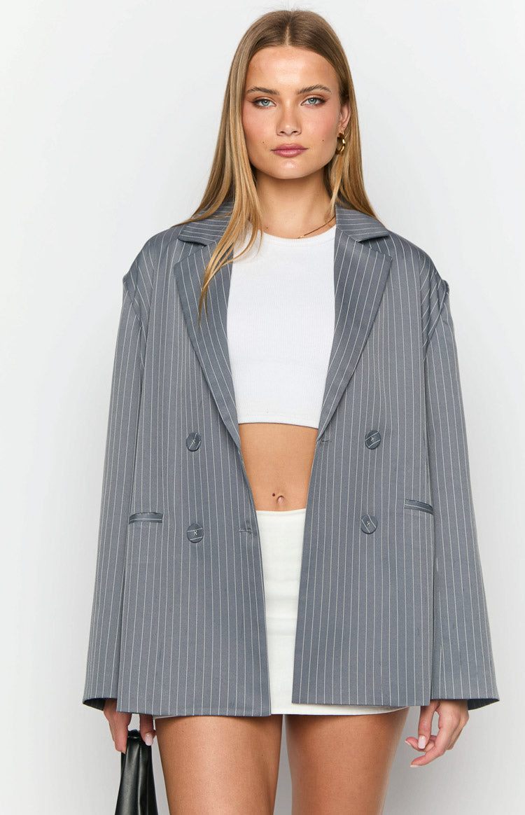 Open grey pinstripe oversized blazer with double-breasted buttons and wide notched lapels