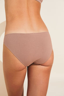 Model wears Pima Stretch Cotton Bikini in Mocha.