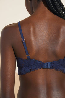 Model wears Rosalia TENCEL Modal Bralette in Navy.