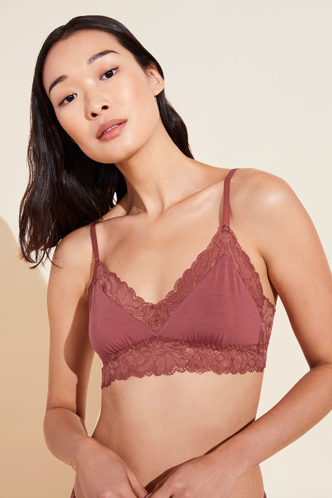 Model wears Rosalia TENCEL Modal Bralette in Rosewood.