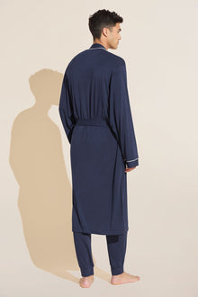 Model wears William TENCEL Modal Robe in True Navy/Ivory.