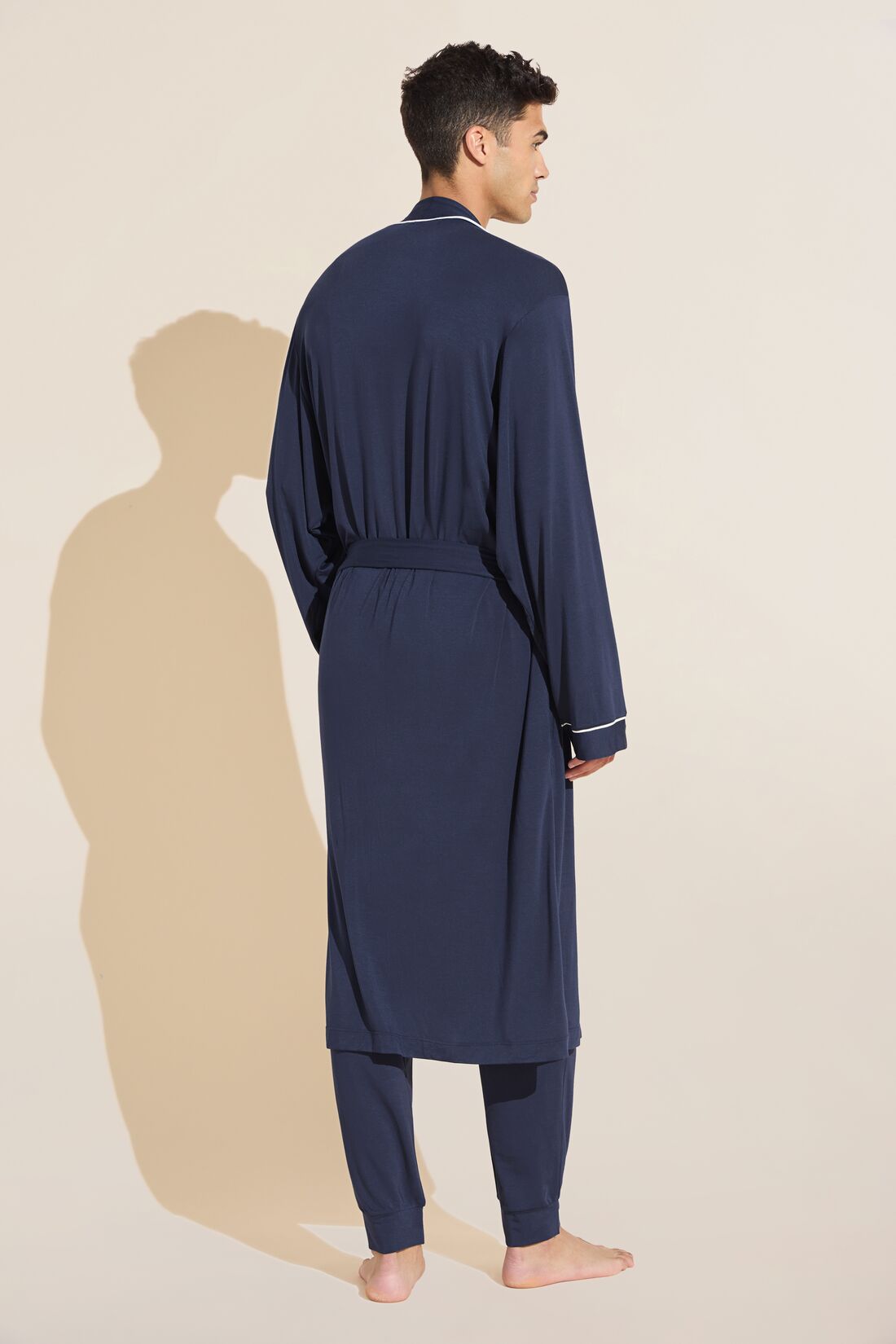 Model wears William TENCEL Modal Robe in True Navy/Ivory.