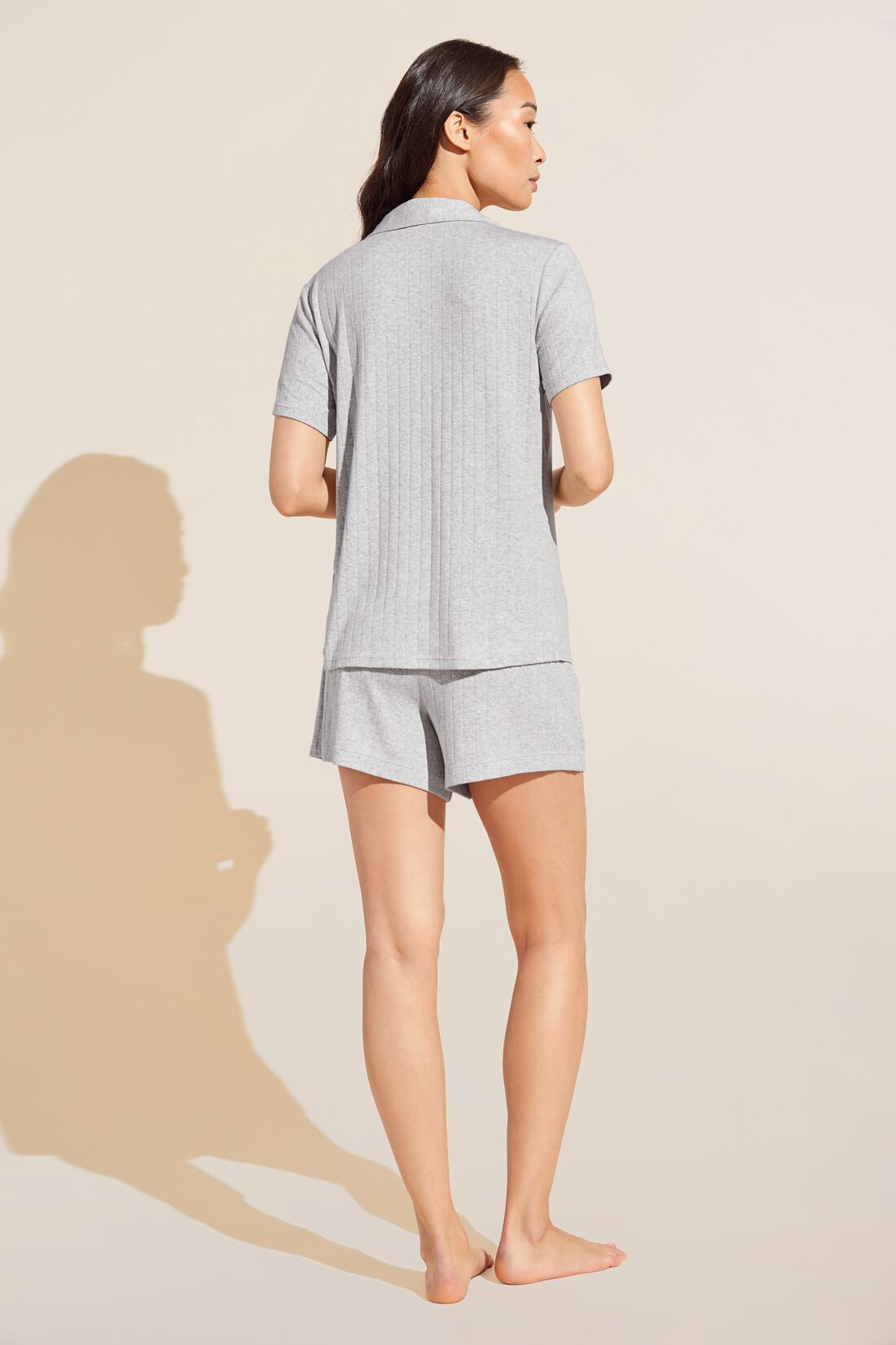 Model wears Gisele TENCEL Modal Rib Relaxed Short PJ Set in light heather grey.
