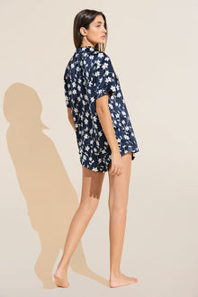 Model wears Inez Washable Silk Printed Short PJ Set in Modern Floral Navy/Navy.