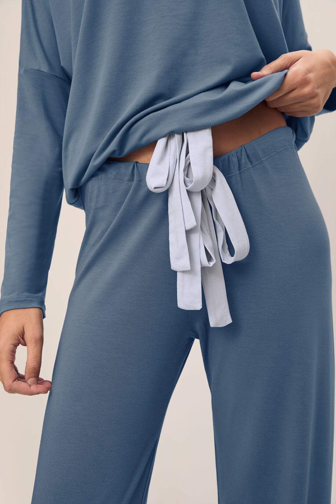Model wears Gisele TENCEL Modal Slouchy PJ Set in Coastal Blue/Ice Blue.